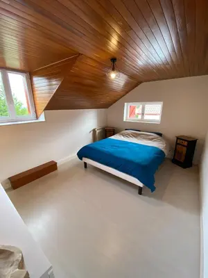Un ou plusieurs lits dans un hébergement de l'établissement Maison calme et chaleureuse au coeur du Béarn