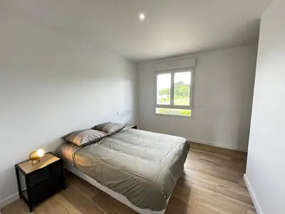 Un ou plusieurs lits dans un hébergement de l'établissement Villa Climatisée 8 Pers, 4 chambres, 3 Sdb