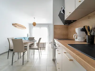 Cuisine ou kitchenette dans l'établissement Mimizan Plage - T2 équipé à 400m océan, parking, 4 pers. - FR-1-50-178
