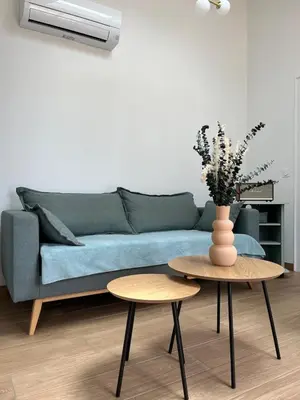 Coin salon dans l'établissement Studio neuf avec Terasse Jardin