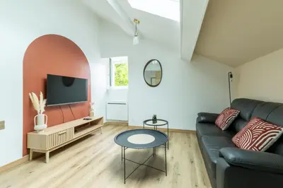 Télévision ou salle de divertissement dans l'établissement Cocon Dacquois