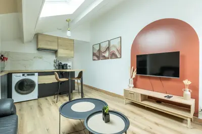 Télévision ou salle de divertissement dans l'établissement Cocon Dacquois