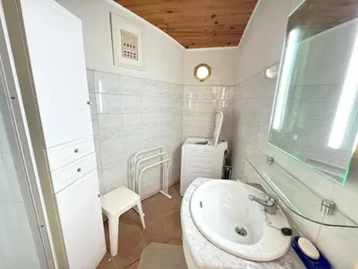 Salle de bains dans l'établissement Maison de charme au cœur du Moulleau, 4 couchages - FR-1-474-279