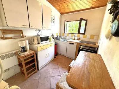 Cuisine ou kitchenette dans l'établissement Maison de charme au cœur du Moulleau, 4 couchages - FR-1-474-279