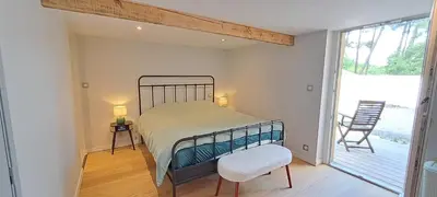 Un ou plusieurs lits dans un hébergement de l'établissement Villa Côte Ouest, Elégance Piscine et Pool-House