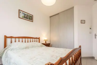 Un ou plusieurs lits dans un hébergement de l'établissement Maison 3 chambres Biscarrosse Bourg proche centre ville