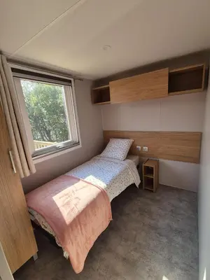 Un ou plusieurs lits dans un hébergement de l'établissement MOBIL HOME BISCAROSSE LAC - Loc du Samedi au Samedi uniquement