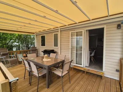 Balcon ou terrasse dans l'établissement MOBIL HOME BISCAROSSE LAC - Loc du Samedi au Samedi uniquement