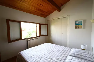 Un ou plusieurs lits dans un hébergement de l'établissement Spacieuse maison familiale entre pins et océan jusqu'à 10 personnes