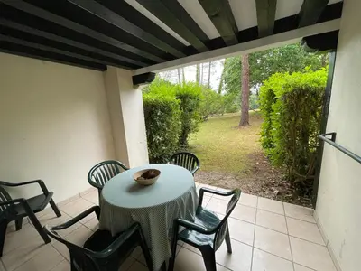 Jardin de l'établissement Joli appartement au golf