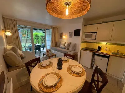 Cuisine ou kitchenette dans l'établissement Joli appartement au golf