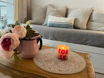 Coin salon dans l'établissement Joli appartement au golf