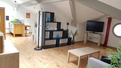 Télévision ou salle de divertissement dans l'établissement L'escapade Landaise, Confort, Plage et Soleil