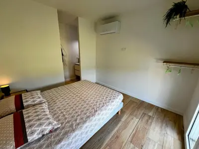Un ou plusieurs lits dans un hébergement de l'établissement Villa Climatisée 8 Pers, 4 chambres, 3 Sdb