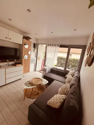 Coin salon dans l'établissement Studio dans les Landes