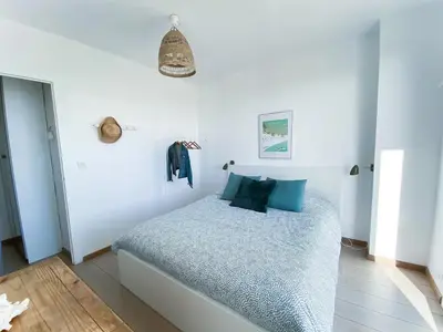 Un ou plusieurs lits dans un hébergement de l'établissement Hossegor plage, un rêve pour les surfeurs !