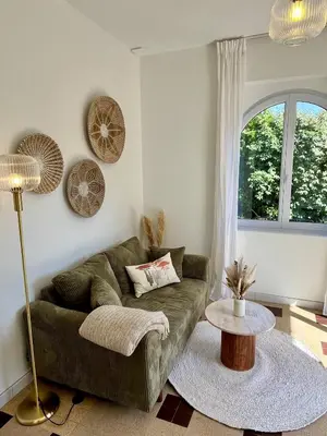 Coin salon dans l'établissement Bel appartement à Capbreton