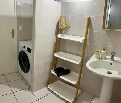 Salle de bains dans l'établissement Bel appartement à Capbreton