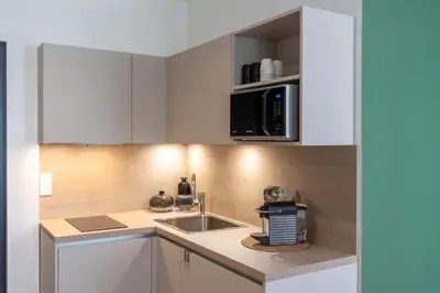 Cuisine ou kitchenette dans l'établissement Charmant studio lumineux au coeur du centre ville