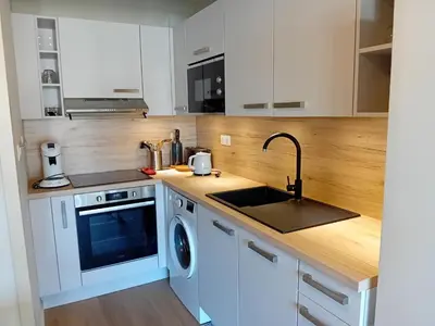 Cuisine ou kitchenette dans l'établissement Seignosse : Appartement rénové à pied des plages avec climatisation - FR-1-239-1126