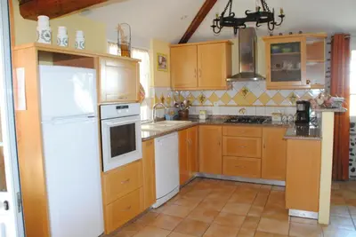 Cuisine ou kitchenette dans l'établissement Gîte Matran