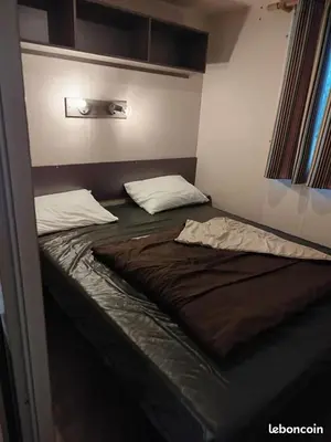 Un ou plusieurs lits dans un hébergement de l'établissement mobil-home 6 couchage sur la côte landaise