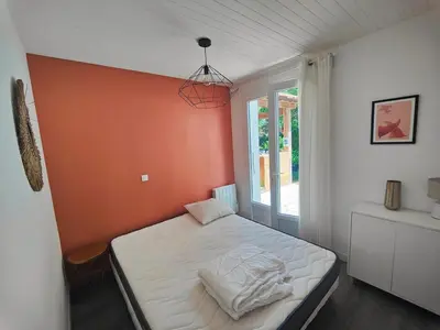 Un ou plusieurs lits dans un hébergement de l'établissement Villa des Hauts Pins