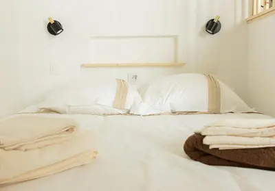 Un ou plusieurs lits dans un hébergement de l'établissement Le mirailh Hyper centre, rénové, lave linge, wifi, coin nuit séparé