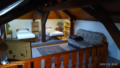 Un ou plusieurs lits dans un hébergement de l'établissement Maison de maître