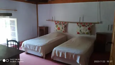 Un ou plusieurs lits dans un hébergement de l'établissement Maison de maître