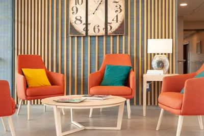 Coin salon dans l'établissement Quality Aparthotel Mont-de-Marsan