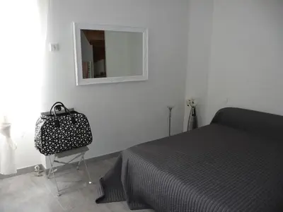 Un ou plusieurs lits dans un hébergement de l'établissement Maison de ville tout confort