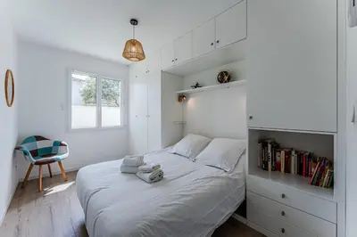 Un ou plusieurs lits dans un hébergement de l'établissement House with heated pool