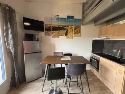 Cuisine ou kitchenette dans l'établissement Les Cottages 1 - Appartement au bord de l'océan