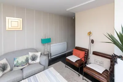 Coin salon dans l'établissement Appartement Lac marin