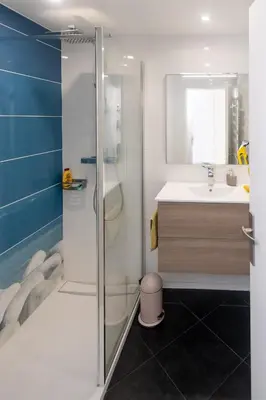 Salle de bains dans l'établissement Appartement Lac marin