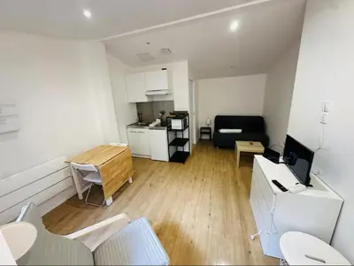 Cuisine ou kitchenette dans l'établissement Neuf lumineux et agréable en rdc avec terrasse - 33
