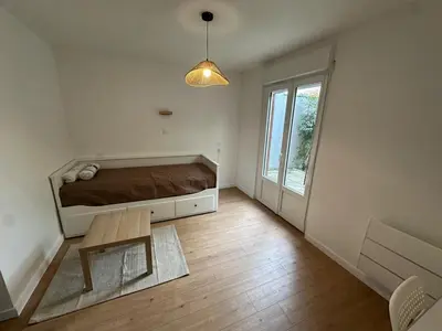 Un ou plusieurs lits dans un hébergement de l'établissement Appartement tout neuf avec patio - 31