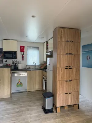 Cuisine ou kitchenette dans l'établissement Mobil-home plage des casernes