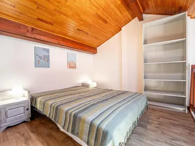 Un ou plusieurs lits dans un hébergement de l'établissement Mimizan Plage Sud : Bel appartement pour 4, proche océan, parking privatif - Ménage inclus - FR-1-50-183