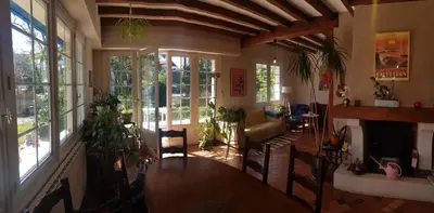 Coin salon dans l'établissement Au petit Ruisseau, maison à Capbreton