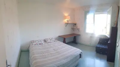 Un ou plusieurs lits dans un hébergement de l'établissement Au petit Ruisseau, maison à Capbreton