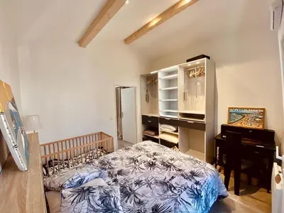 Un ou plusieurs lits dans un hébergement de l'établissement Maison avec jardin et accès Wi-Fi à Capbreton - FR-1-413-260