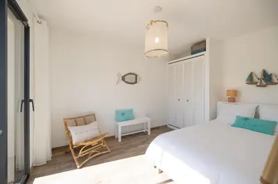 Un ou plusieurs lits dans un hébergement de l'établissement Villa vacances Bassin d'Arcachon