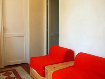 Coin salon dans l'établissement Maisonnette dans parc de 4 ha