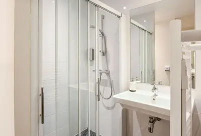 Salle de bains dans l'établissement Logis Hôtels Gnàc é Pause