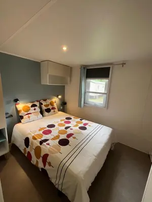 Un ou plusieurs lits dans un hébergement de l'établissement Mobilhome Sauvage