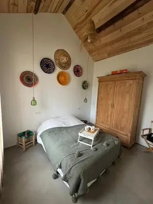 Coin salon dans l'établissement Maison chaleureuse dans les Landes à 2 min du lac et 25 min de Plage Biscarosse en voiture