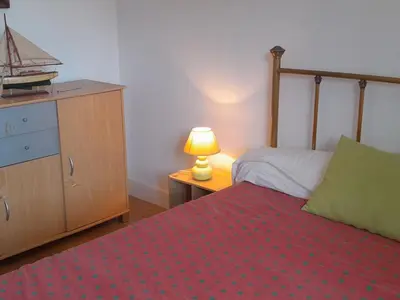 Un ou plusieurs lits dans un hébergement de l'établissement Maison 2 chambres, proche plage et commerces à Capbreton - FR-1-239-1137