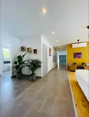 Télévision ou salle de divertissement dans l'établissement Villa d'exception à Capbreton proche des plages